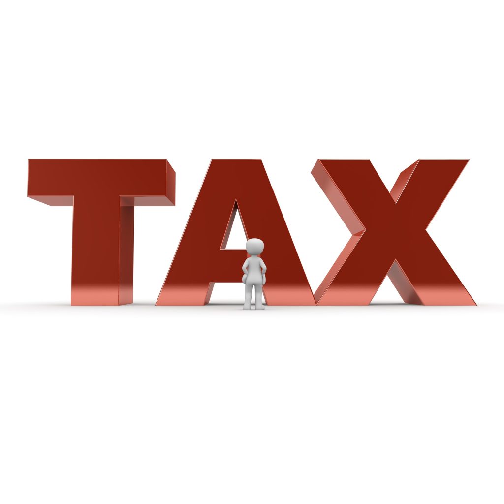Returning UK resident reviewing overseas income and HMRC tax obligations after moving back to Britain